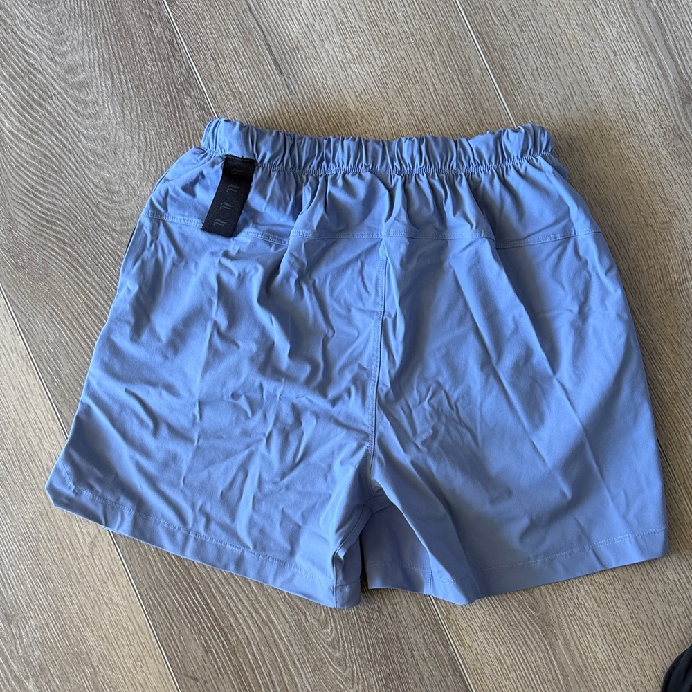 Fabletics Men's Athletic Lined Shorts Trio - Blue, Black, Beige - Picture 15 of 15